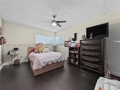 Tucked behind a private, palm-lined entrance in sought-after - photo 24