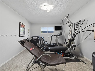 Tucked behind a private, palm-lined entrance in sought-after - photo 26