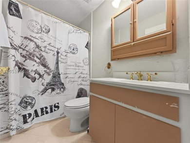 Tucked behind a private, palm-lined entrance in sought-after - photo 27