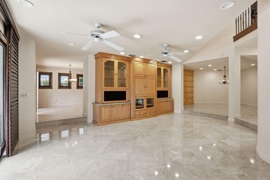 Set along the fairways of Pine Tree Golf Club, this fully - photo 27