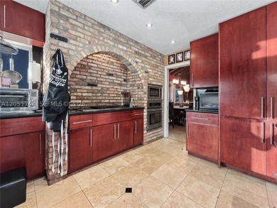Tucked behind a private, palm-lined entrance in sought-after - photo 33