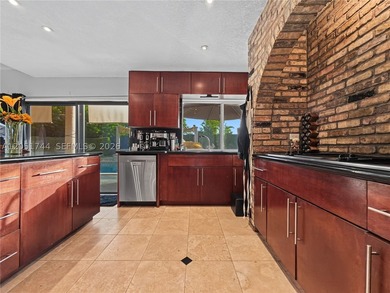 Tucked behind a private, palm-lined entrance in sought-after - photo 35