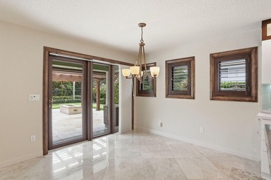 Set along the fairways of Pine Tree Golf Club, this fully - photo 36