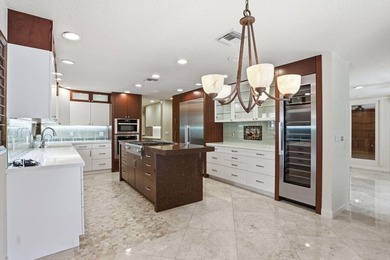 Set along the fairways of Pine Tree Golf Club, this fully - photo 37