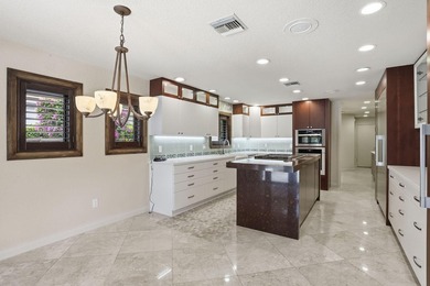 Set along the fairways of Pine Tree Golf Club, this fully - photo 38