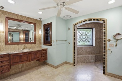Set along the fairways of Pine Tree Golf Club, this fully - photo 48