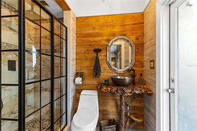 Set behind a gated entrance on 10 private acres in the sought - photo 19