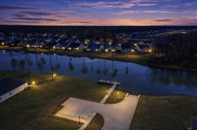 Beautifully positioned on a peaceful pond homesite in the highly - photo 3