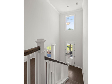 Beautifully positioned on a peaceful pond homesite in the highly - photo 9