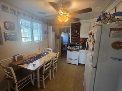 Rare 3 bed 1 bath waterfront cottage on Potter Pond!!! Located - photo 10