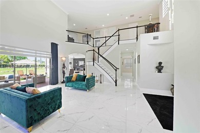 Located in the prestigious gated community of Harbour Lakes - photo 9