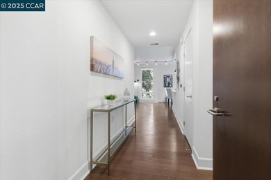 Don't miss this modern 1 bed, 1.5 bath end-unit condo in the