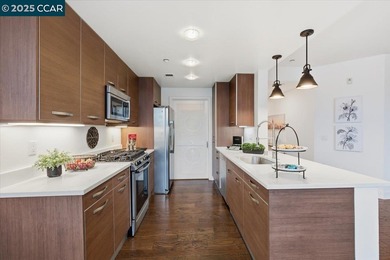 Don't miss this modern 1 bed, 1.5 bath end-unit condo in the