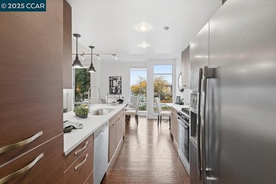 Don't miss this modern 1 bed, 1.5 bath end-unit condo in the