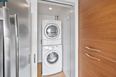 Don't miss this modern 1 bed, 1.5 bath end-unit condo in the