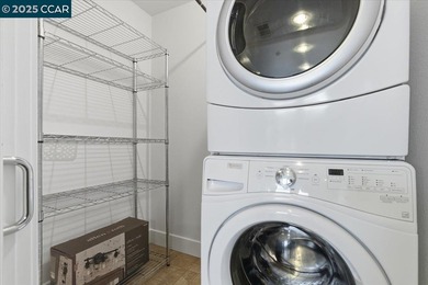 Don't miss this modern 1 bed, 1.5 bath end-unit condo in the