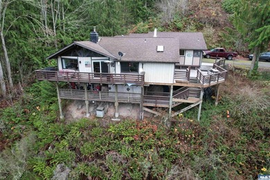 Set on over 5 private acres, this distinctive 2270sf home blends - photo 12