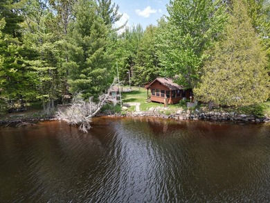 MOTIVATED SELLER - A dollhouse cottage right at the water's edge - photo 4
