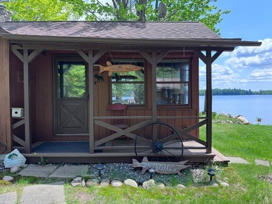 MOTIVATED SELLER - A dollhouse cottage right at the water's edge - photo 6