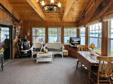 MOTIVATED SELLER - A dollhouse cottage right at the water's edge - photo 7
