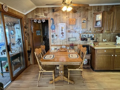MOTIVATED SELLER - A dollhouse cottage right at the water's edge - photo 9