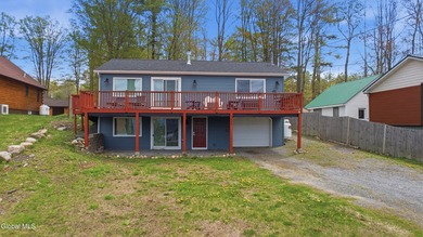 Welcome to this beautifully updated lakefront home offering the - photo 2