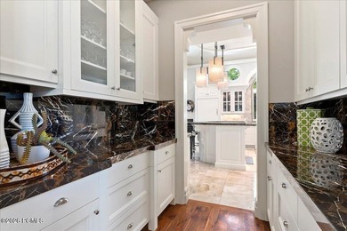 Tucked away on a private, tree-lined lane in Holladay, this - photo 20