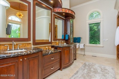 Tucked away on a private, tree-lined lane in Holladay, this - photo 41