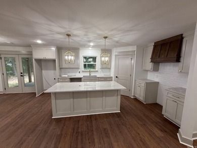 New construction home nestled on a private, wooded lot offering - photo 10