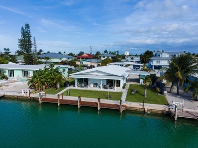 If you need more dockage than most half duplexes in Key Colony - photo 1