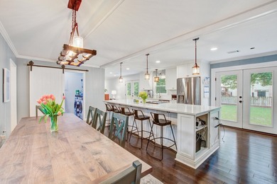 Lovingly updated with a fresh coastal-inspired aesthetic, this - photo 9