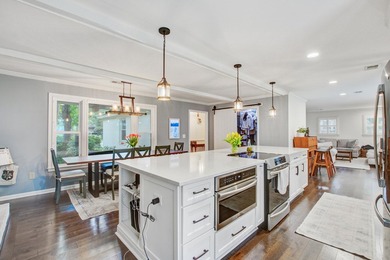 Lovingly updated with a fresh coastal-inspired aesthetic, this - photo 10