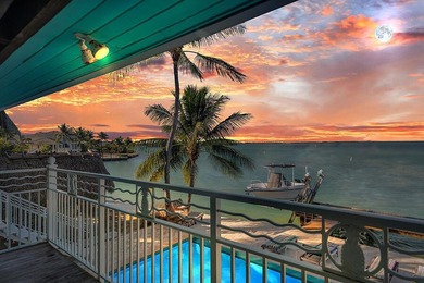 Welcome to 166 Bayview Drive, a rare bayfront estate in the - photo 1