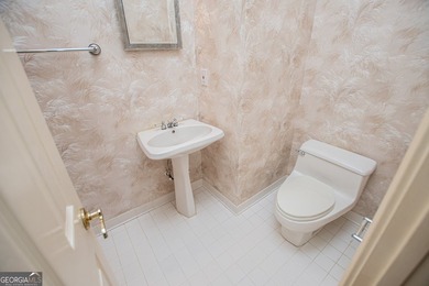 Welcome to this beautifully maintained four-sided brick ranch - photo 11