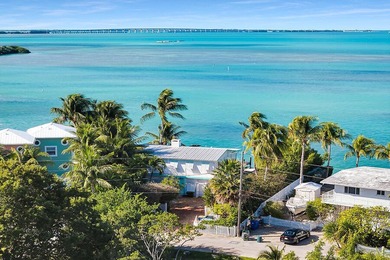 Welcome to 166 Bayview Drive, a rare bayfront estate in the - photo 2