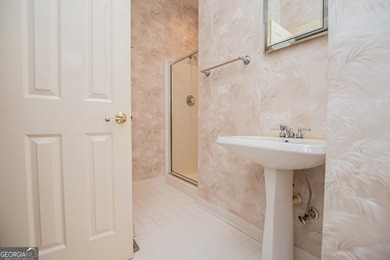 Welcome to this beautifully maintained four-sided brick ranch - photo 12