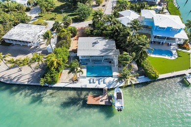 Welcome to 166 Bayview Drive, a rare bayfront estate in the - photo 4