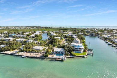 Welcome to 166 Bayview Drive, a rare bayfront estate in the - photo 5