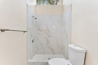 Spacious 3-bedroom, 2-bath villa featuring soaring vaulted - photo 15