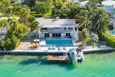 Welcome to 166 Bayview Drive, a rare bayfront estate in the - photo 6