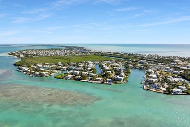 Welcome to 166 Bayview Drive, a rare bayfront estate in the - photo 8