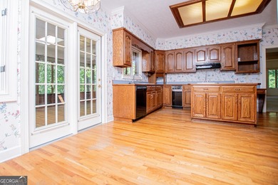Welcome to this beautifully maintained four-sided brick ranch - photo 24