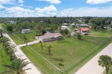 Lake Home For Sale in Bokeelia, Florida