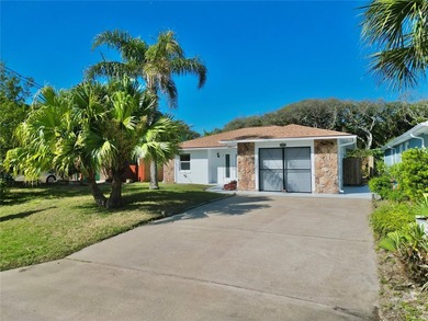 Enjoy coastal living just steps from the beach in this charming - photo 1