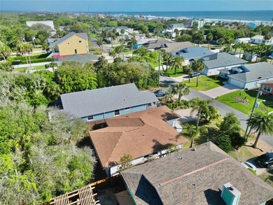 Enjoy coastal living just steps from the beach in this charming - photo 4