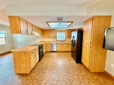 Enjoy coastal living just steps from the beach in this charming - photo 8