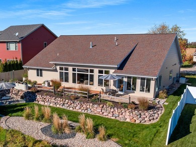 Impressive space and stunning pond views await in this custom