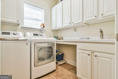 Welcome to this 3-bedroom, 3.5-bathroom home nestled in the - photo 30