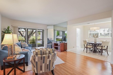 WELCOME TO THIS VERY DESIRABLE CORNER CONDO WITH BEAUTIFUL WATER - photo 1
