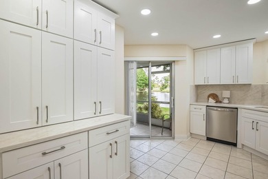 WELCOME TO THIS VERY DESIRABLE CORNER CONDO WITH BEAUTIFUL WATER - photo 7